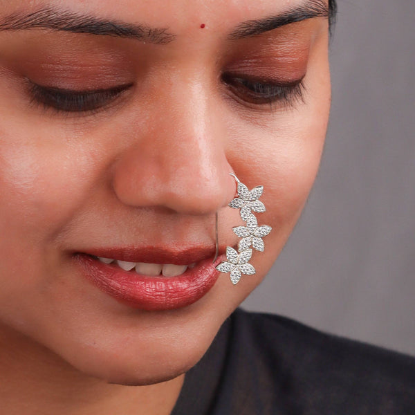 Model wearing CZ flower Nath earring for jewelry style