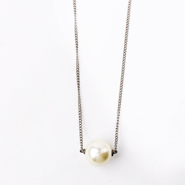 Close-up of the Pearl Chain Fashion Necklace showcasing delicate chain links, smooth pearl accents, and fine craftsmanship