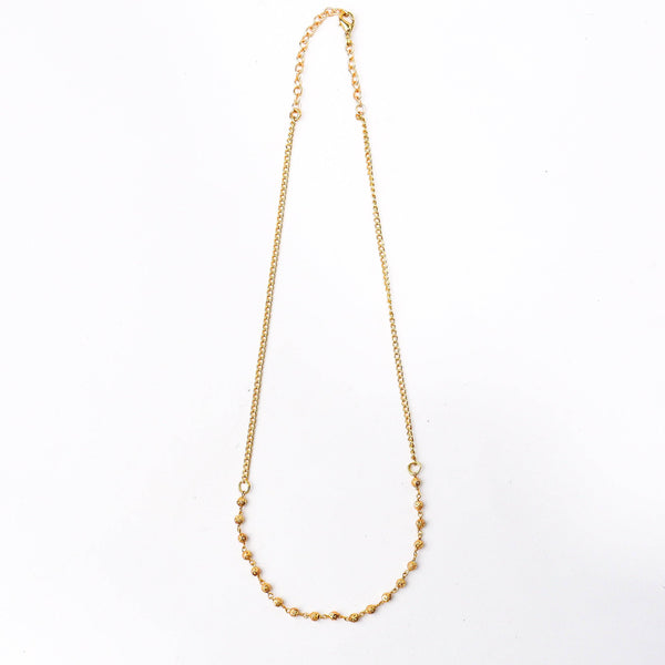 Detailed view of a 22K gold-plated fashion chain highlighting intricate link patterns, smooth texture, and a premium 22K gold-plated finish