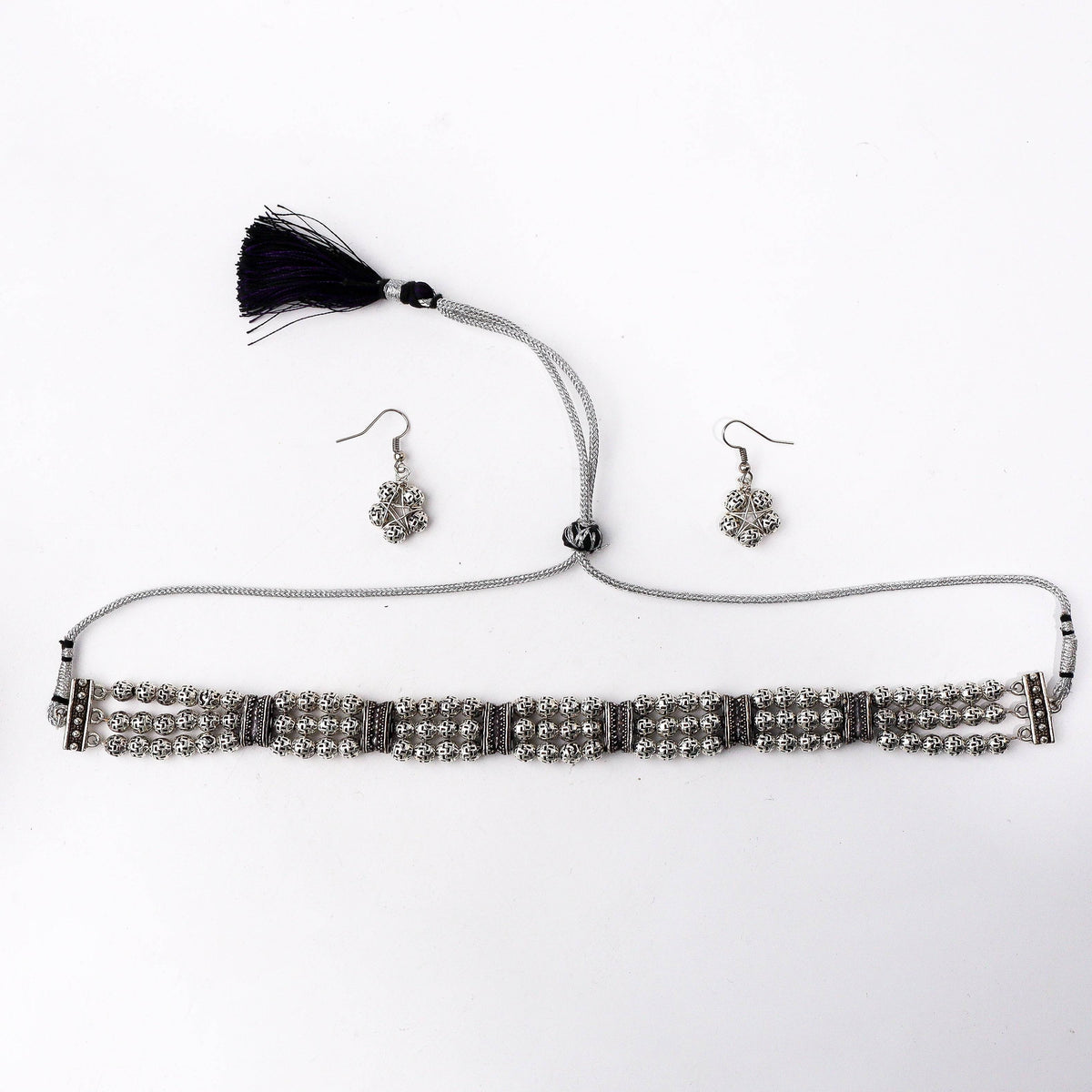 Detailed view of Fashion Set highlighting intricate motifs, textured detailing, and smooth jewellery finish