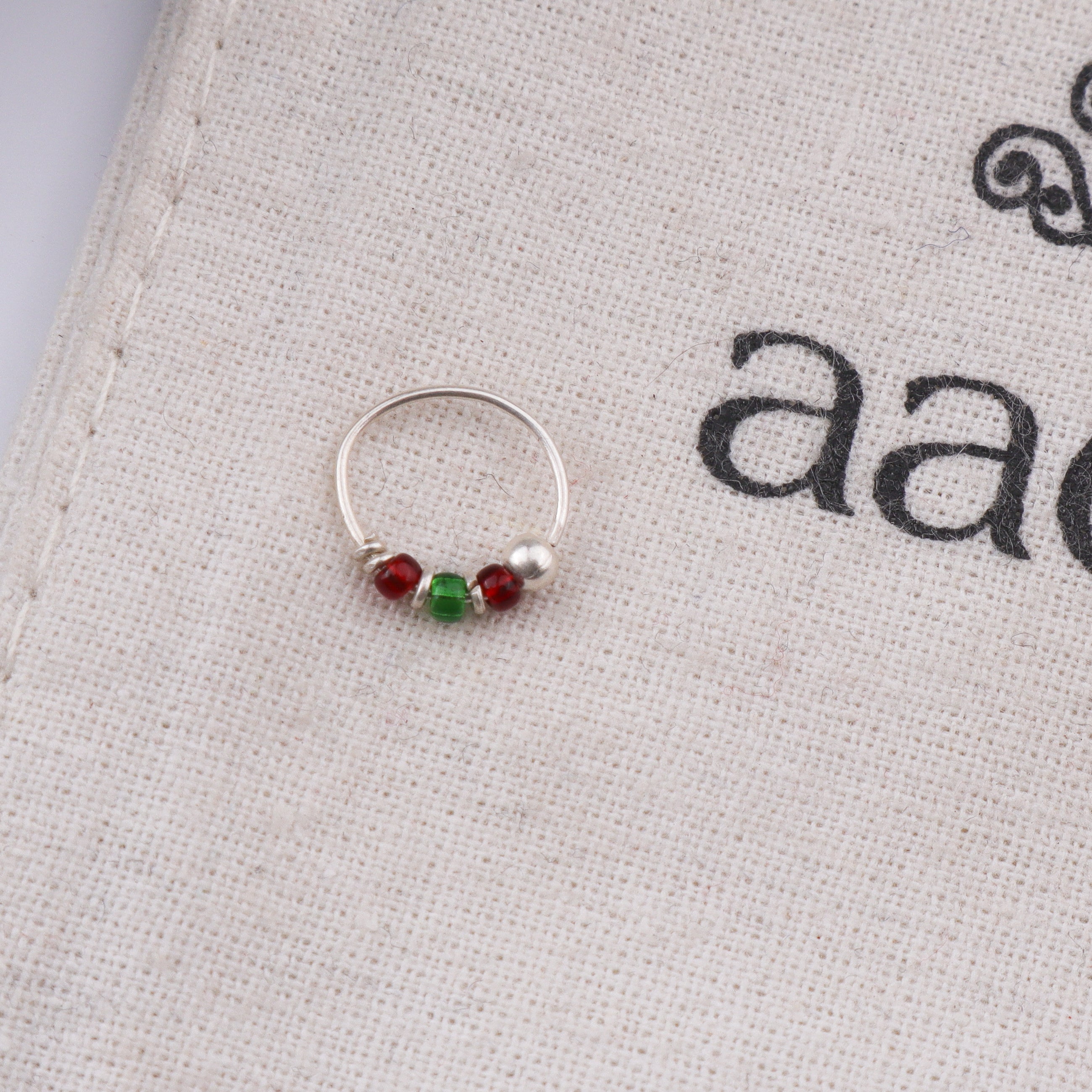 Silver Septum Cum Nose Ring with Green & Red Bead (Pierced)