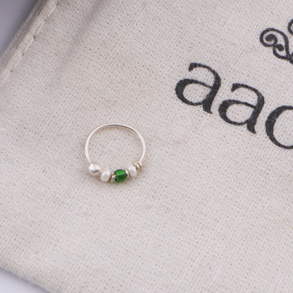 Detailed view of Silver Septum Cum Nose Ring highlighting delicate silver craftsmanship and green and white bead accents