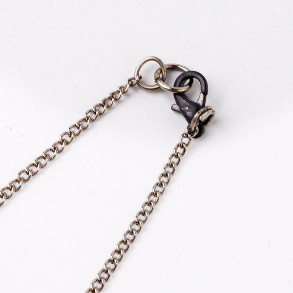 Angled view of the Fashion Chain Necklace highlighting its unique structure, elegant links, and polished finish