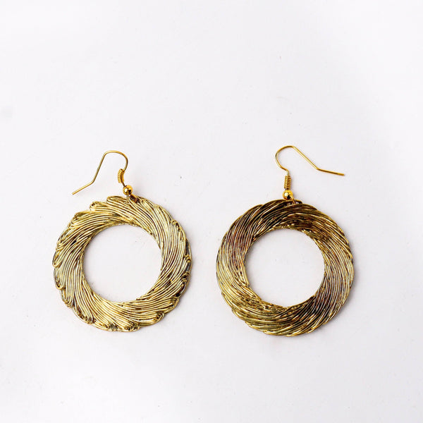 Close-up of 22K gold-plated fashion earring showcasing intricate detailing, fine craftsmanship, and rich 22K gold plating