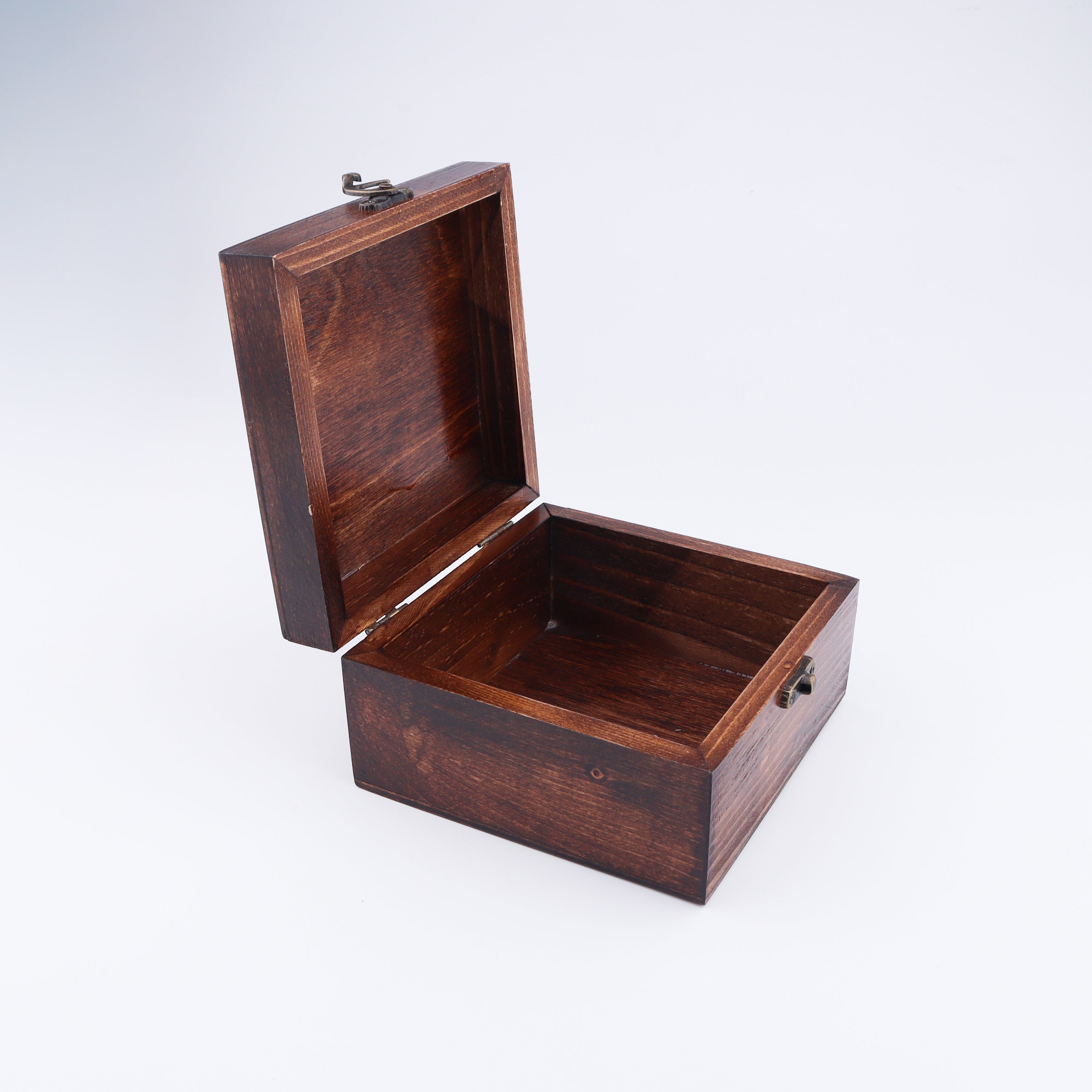 Open wooden storage box for keepsakes