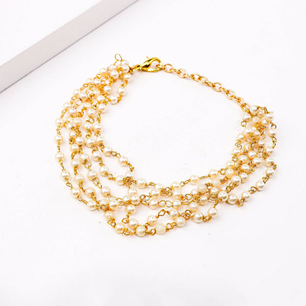 Detailed view of a 22K gold-plated fashion bracelet highlighting intricate motifs, textured detailing, and a premium 22K gold-plated finish