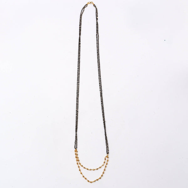 Detailed view of a 22K gold-plated fashion mangalsutra highlighting intricate motifs, traditional detailing, and a premium 22K gold-plated finish