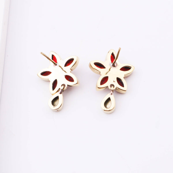 Angled view of Brass Fashion Earrings highlighting the unique silhouette and dimensional design