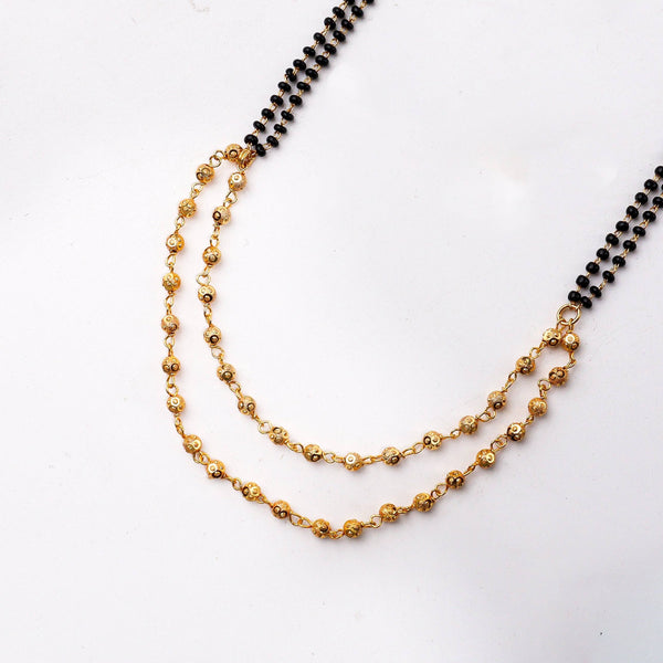 Angled view of a 22K gold-plated fashion mangalsutra highlighting its elegant structure, unique design, and polished gold finish