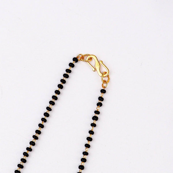Angled view of 22K gold-plated fashion mangalsutra highlighting its elegant structure, unique design, and polished gold finish