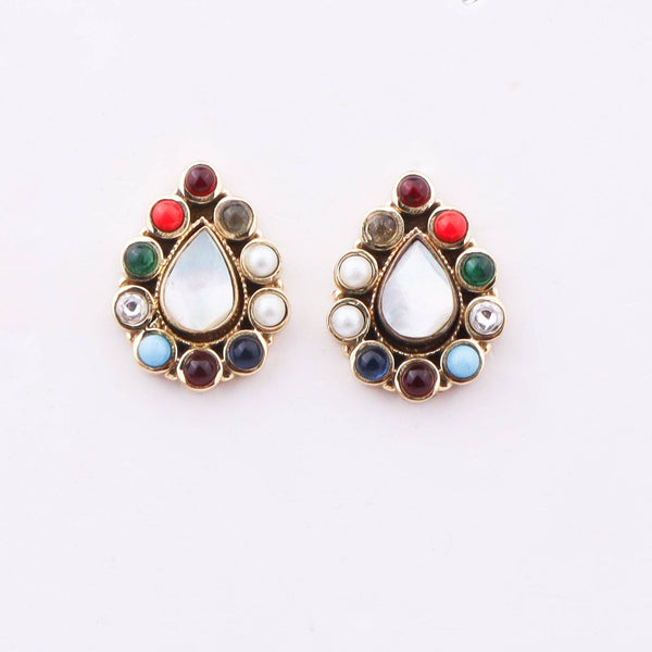Close-up of Brass Fashion Earrings showcasing intricate detailing, textured elements, and fine craftsmanship