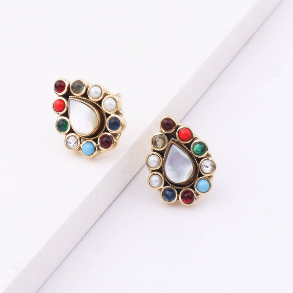 Detailed view of Brass Fashion Earrings highlighting intricate motifs, textured surface, and refined brass finish