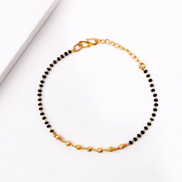 Close-up of 22K gold-plated fashion mangalsutra bracelet showcasing intricate detailing, traditional elements, and fine craftsmanship
