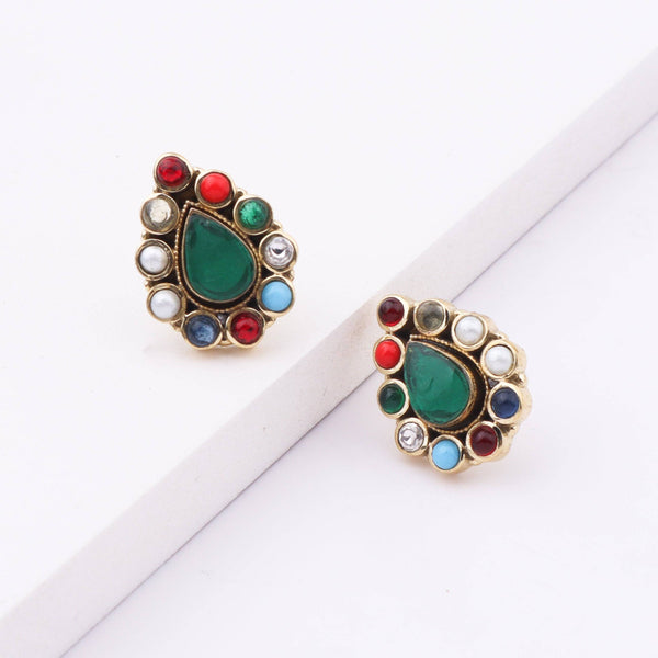 Detailed view of Brass Fashion Earrings highlighting intricate motifs, textured surface, and refined brass finish