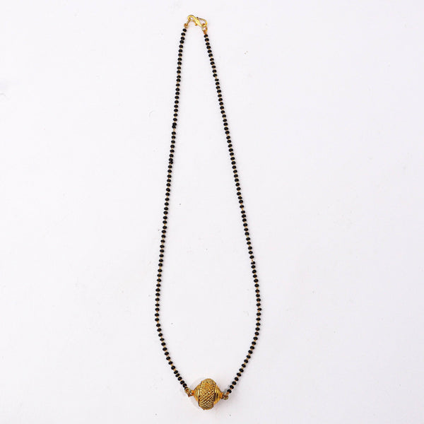 Detailed view of a 22K gold-plated fashion mangalsutra highlighting intricate motifs, traditional detailing, and a premium 22K gold-plated finish