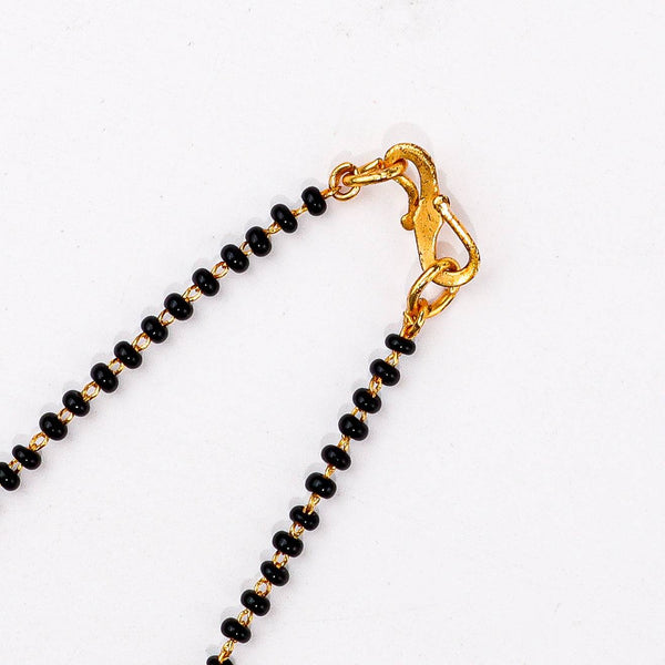 Angled view of a 22K gold-plated fashion mangalsutra highlighting its elegant structure, unique design, and polished gold finish