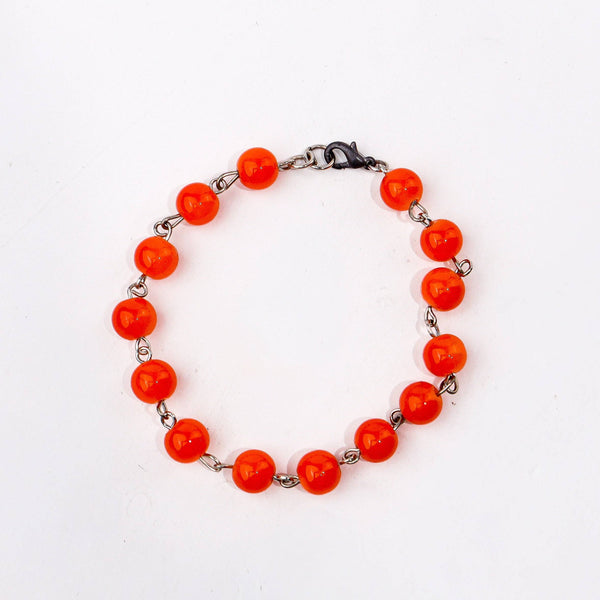 Angled view of Fashion Bracelet highlighting its unique structure, stylish silhouette, and polished finish