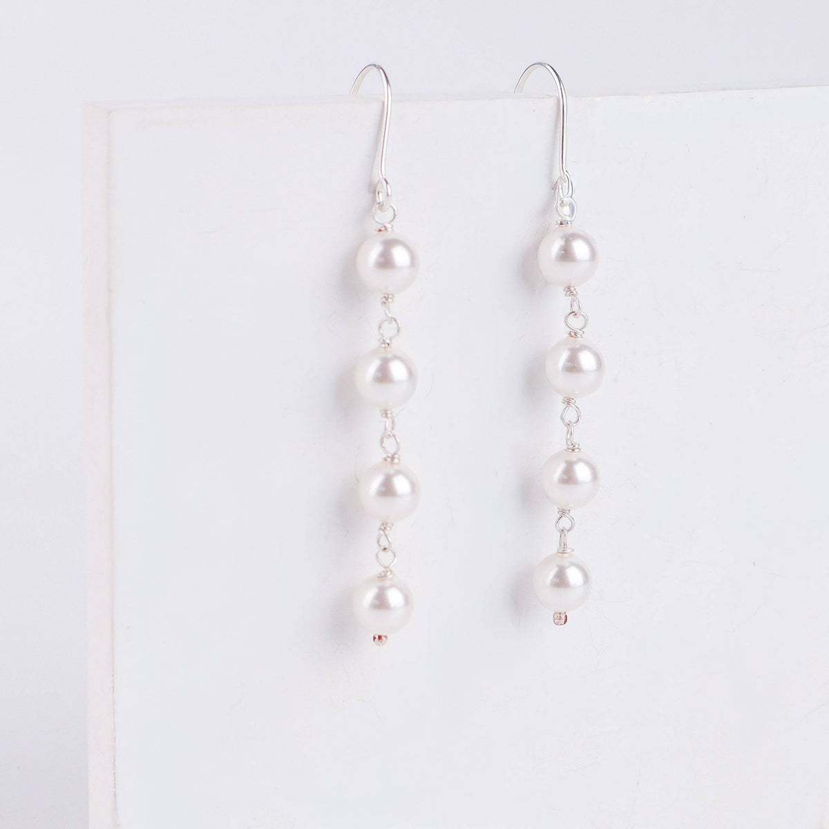 Model wearing Pearl Dangling Earring for elegant look