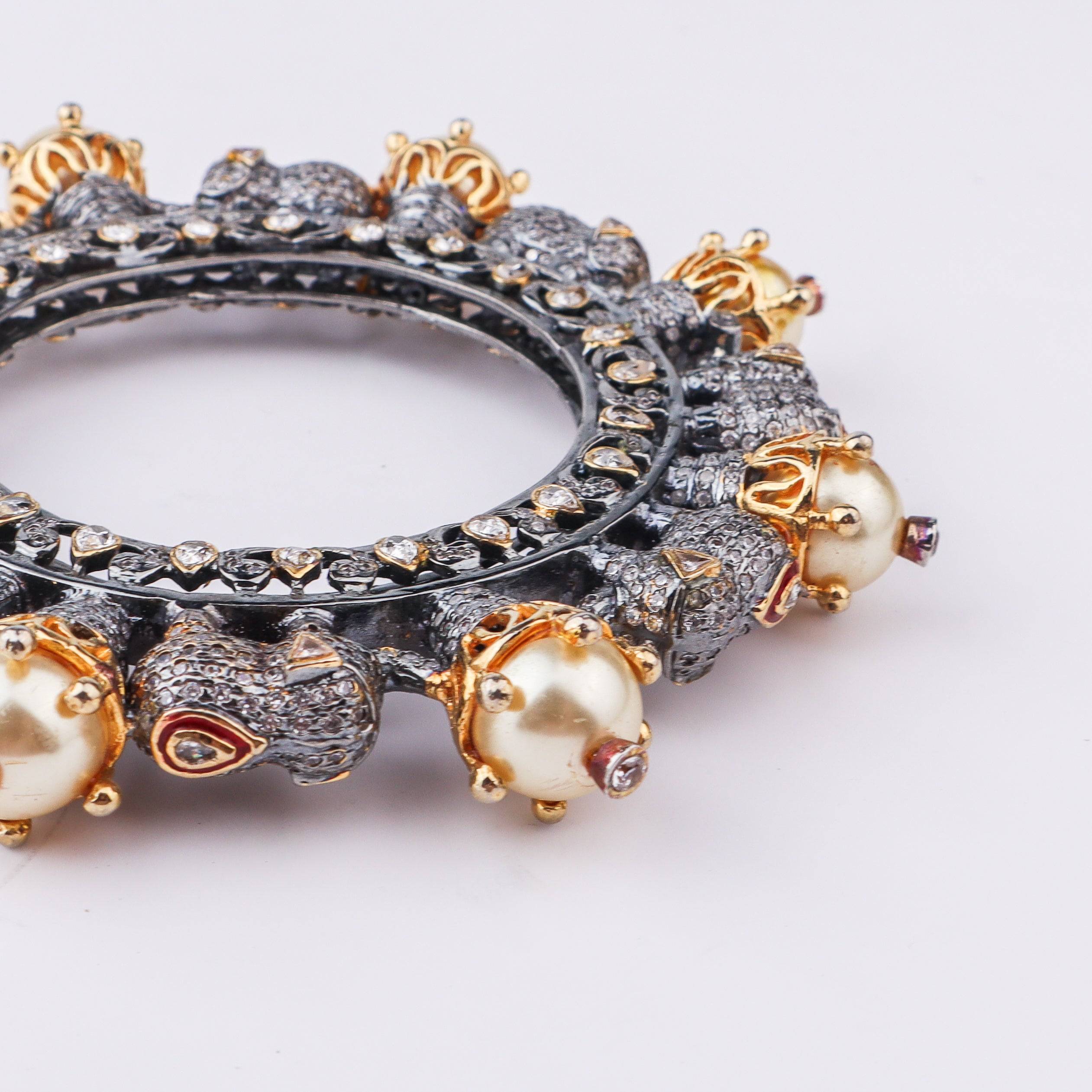 Angled view of 22K gold-plated fashion bangle (Single) highlighting its elegant structure and polished gold finish