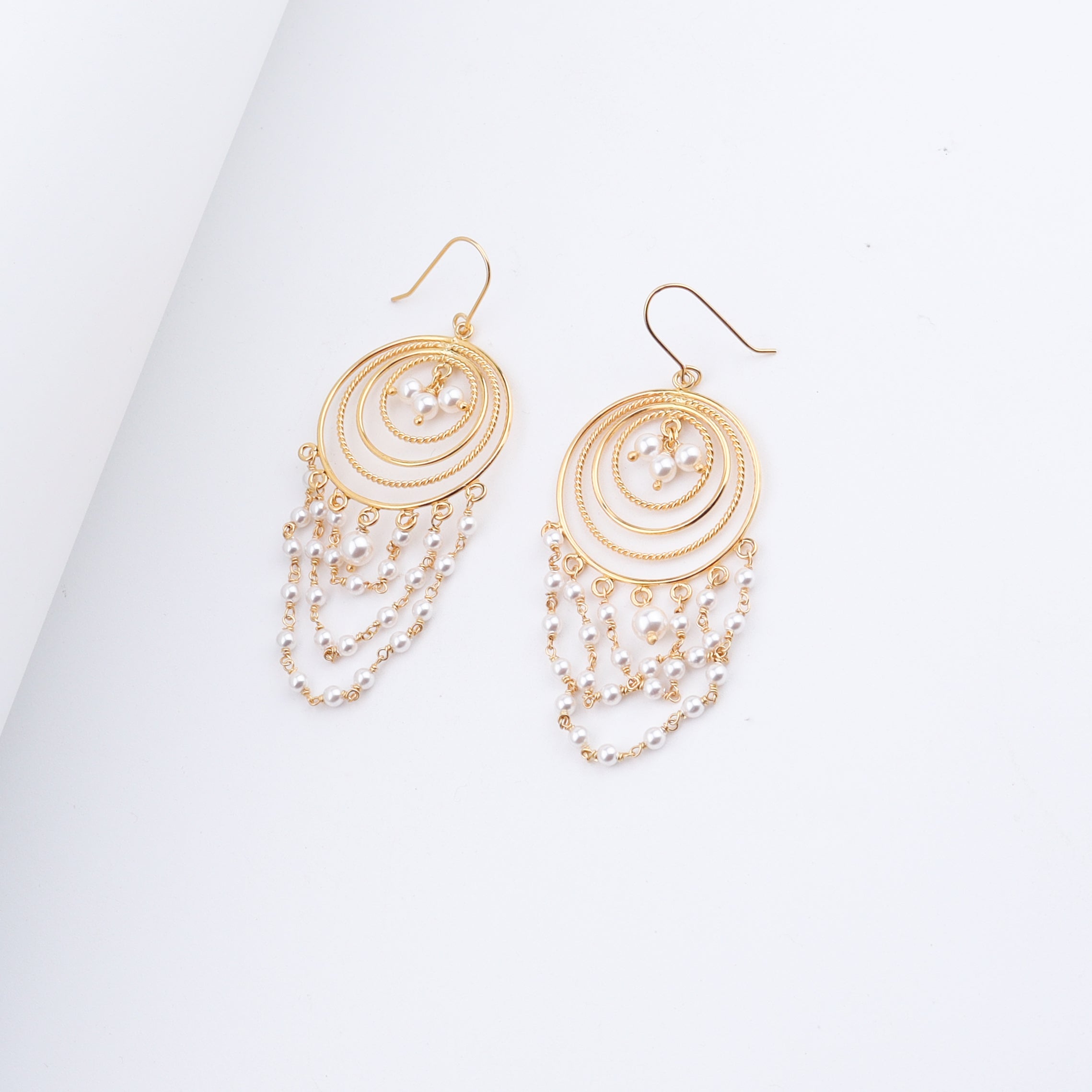 Gold plated pearl chandbali earrings with cascading pearls