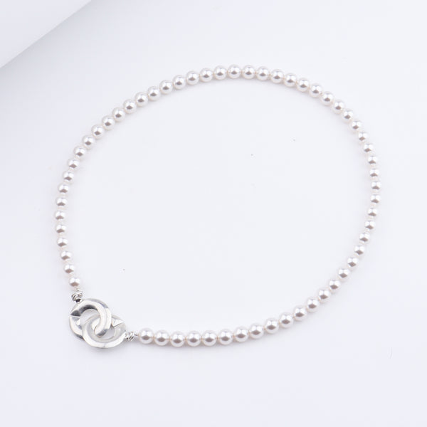 White pearl beaded necklace with silver clasp