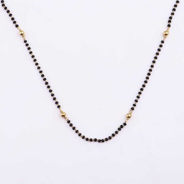 Gold Chain with Black Beads on White Background