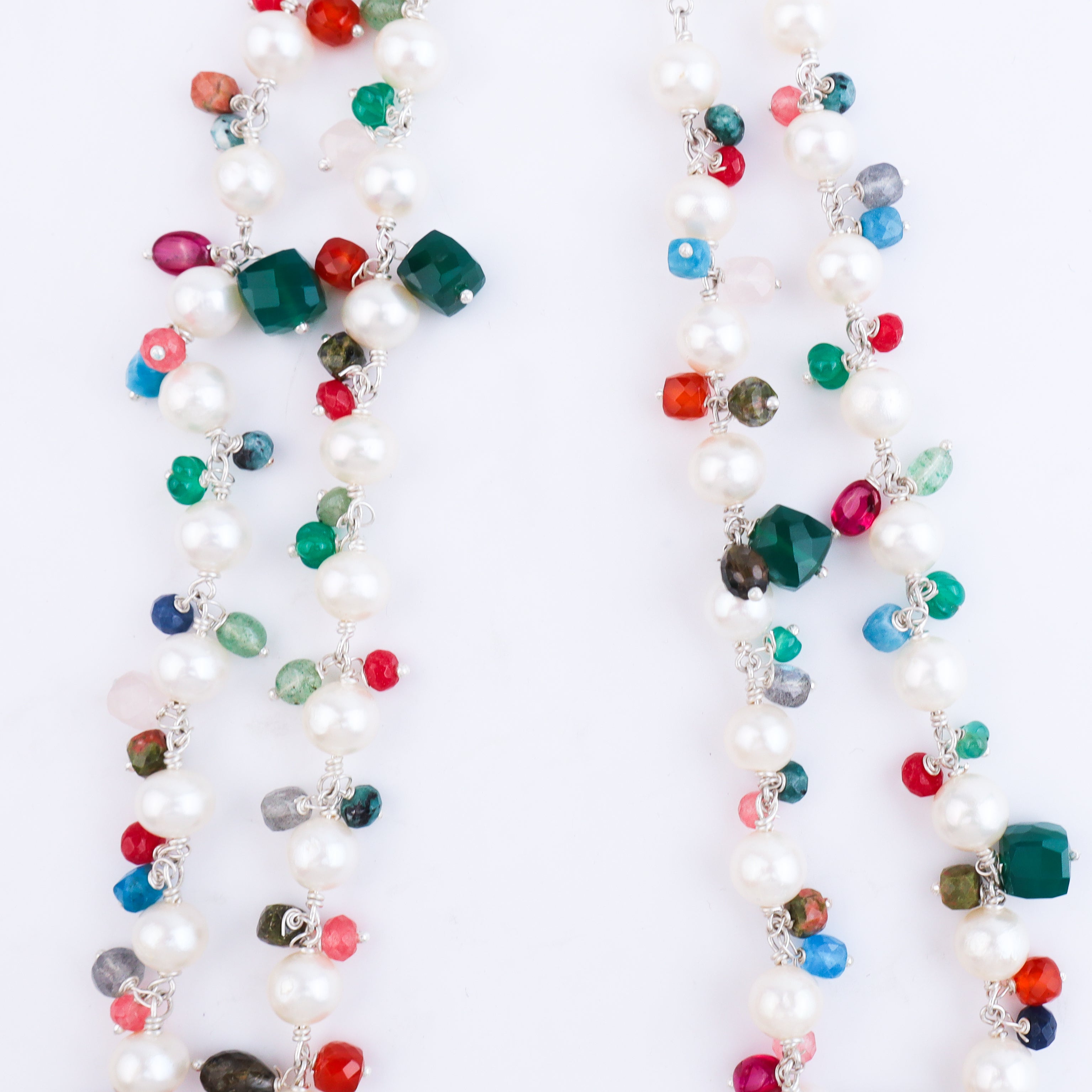 Close-up of multicolored pearl necklace with beads