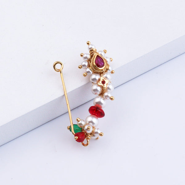 Pearl and red gemstone nose ring on white background