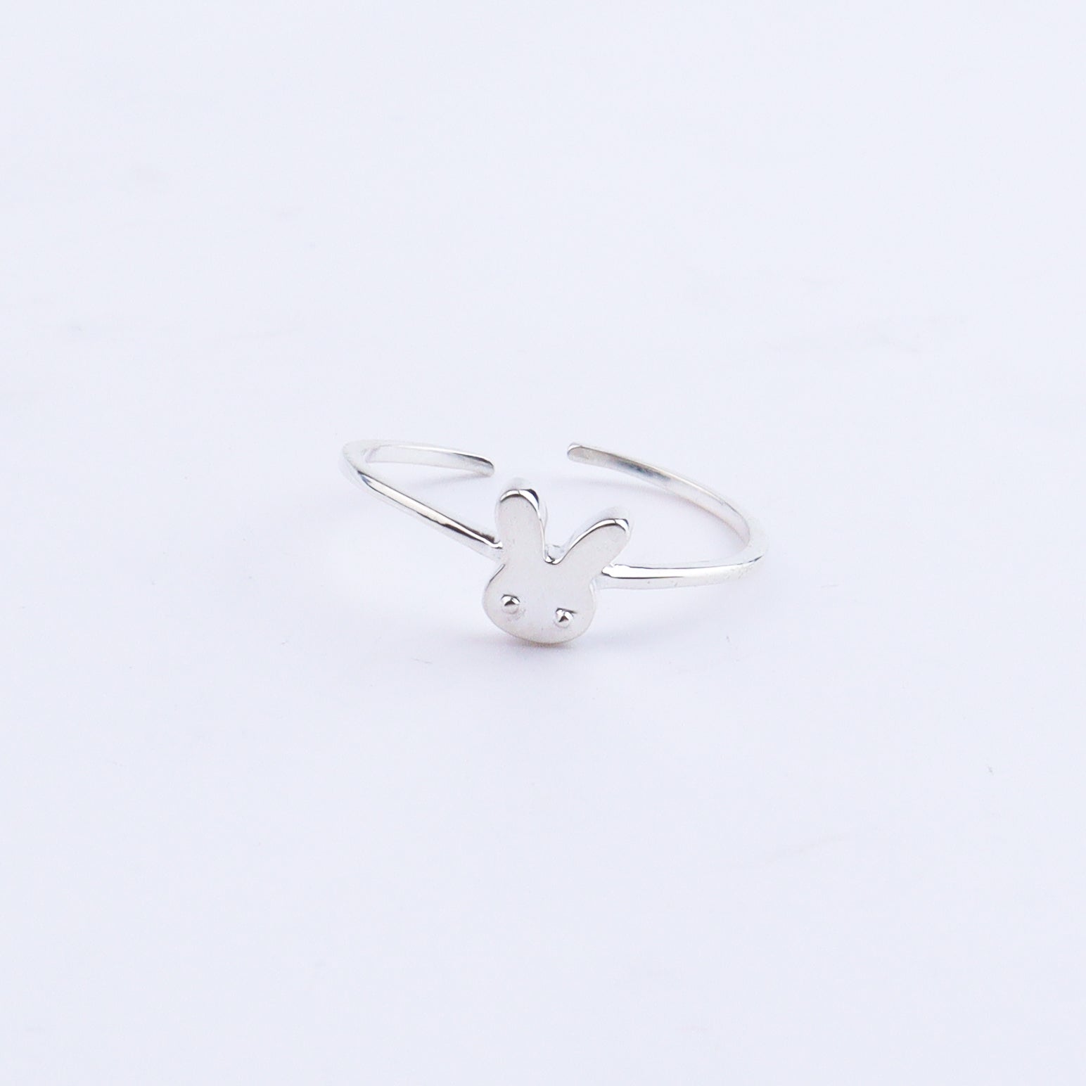 Silver bunny ring on white background