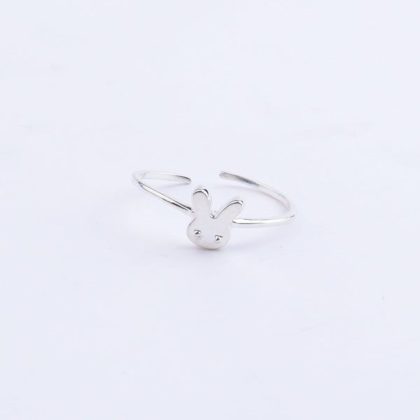 Silver bunny ring on white background