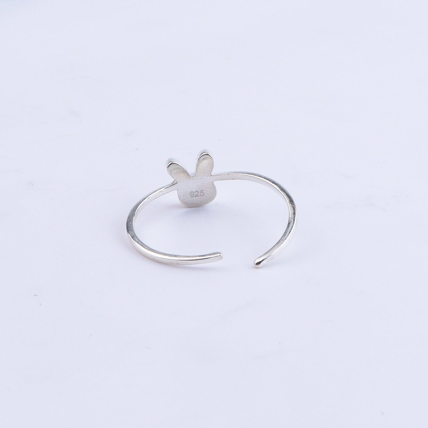 Back view of bunny ring showing hallmark