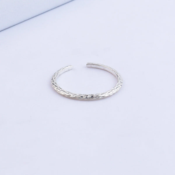 Silver textured ring close-up