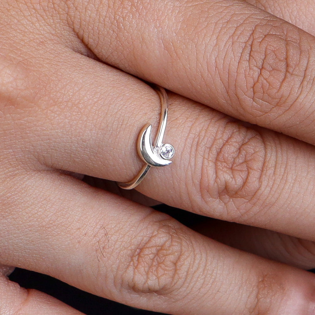 Close-up of sterling silver ring on finger