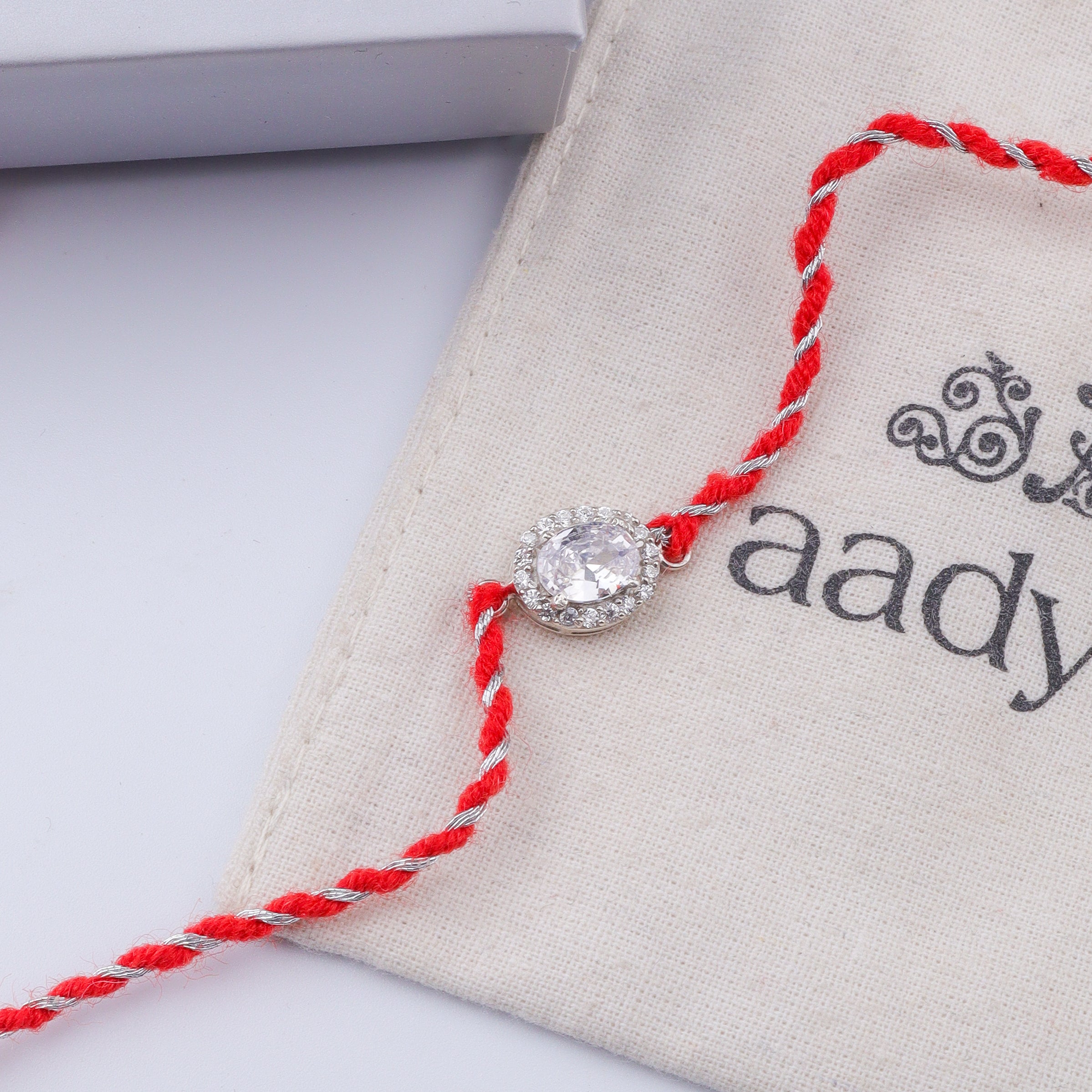 Oval Halo Silver CZ Rakhi