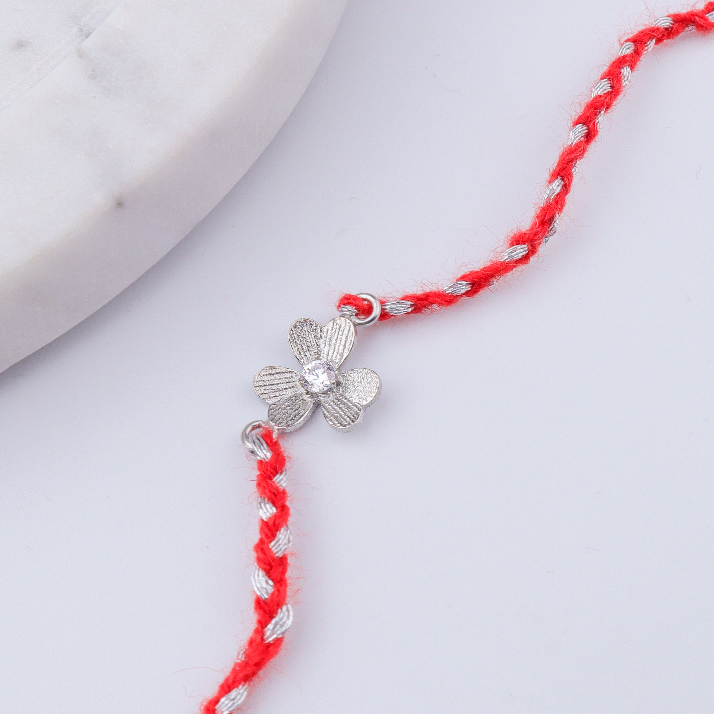Clove Leaf Silver CZ Rakhi