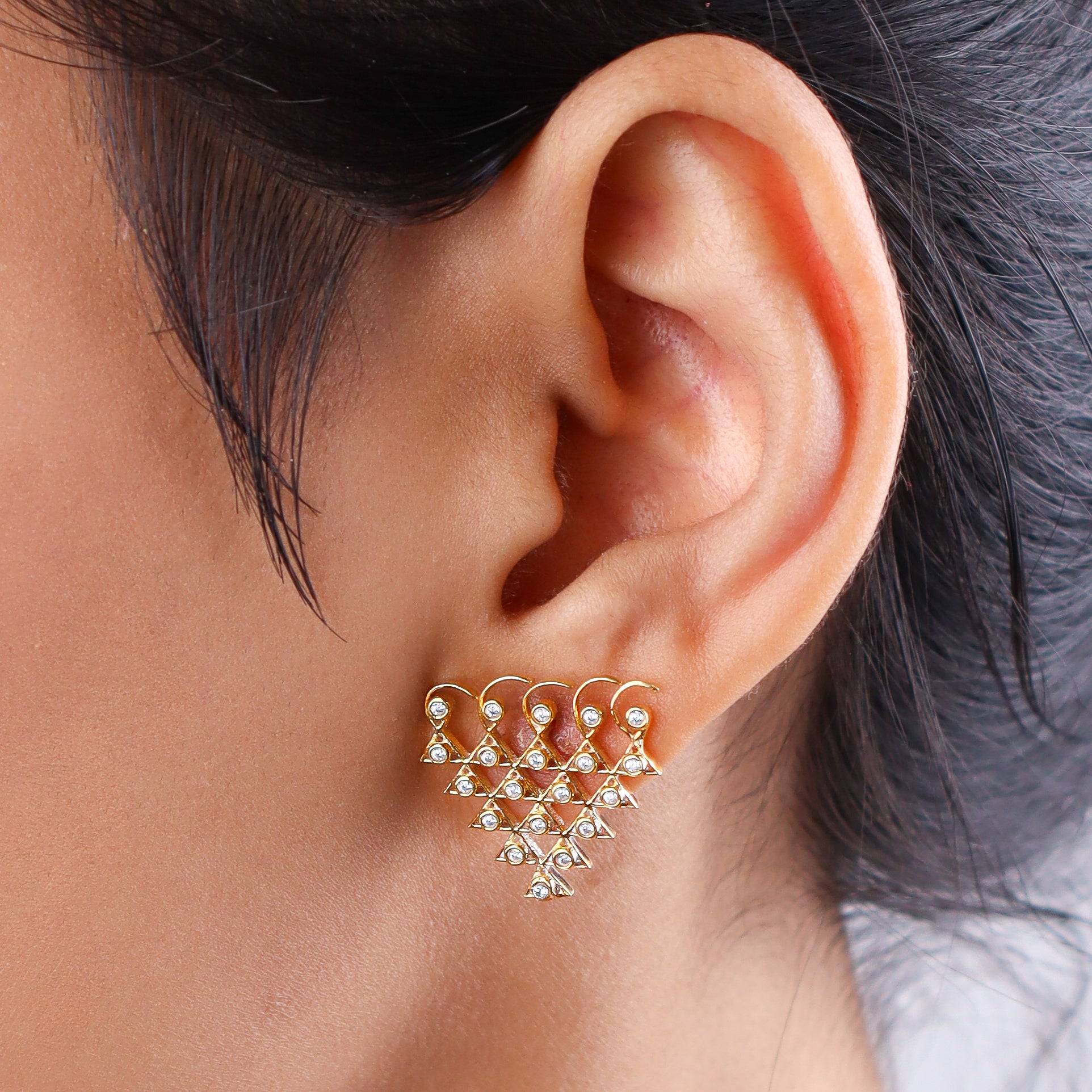 Model wearing Saraswati Earrings in 22K gold-plated finish for an elegant traditional jewellery look