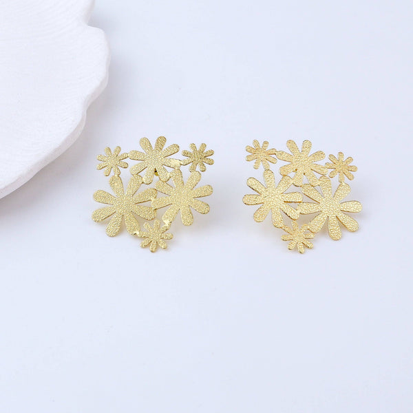 Close-up of Brass Fashion Earrings showcasing intricate detailing, textured elements, and fine craftsmanship