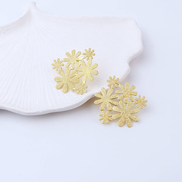 Detailed view of Brass Fashion Earrings highlighting intricate motifs, textured surface, and refined brass finish