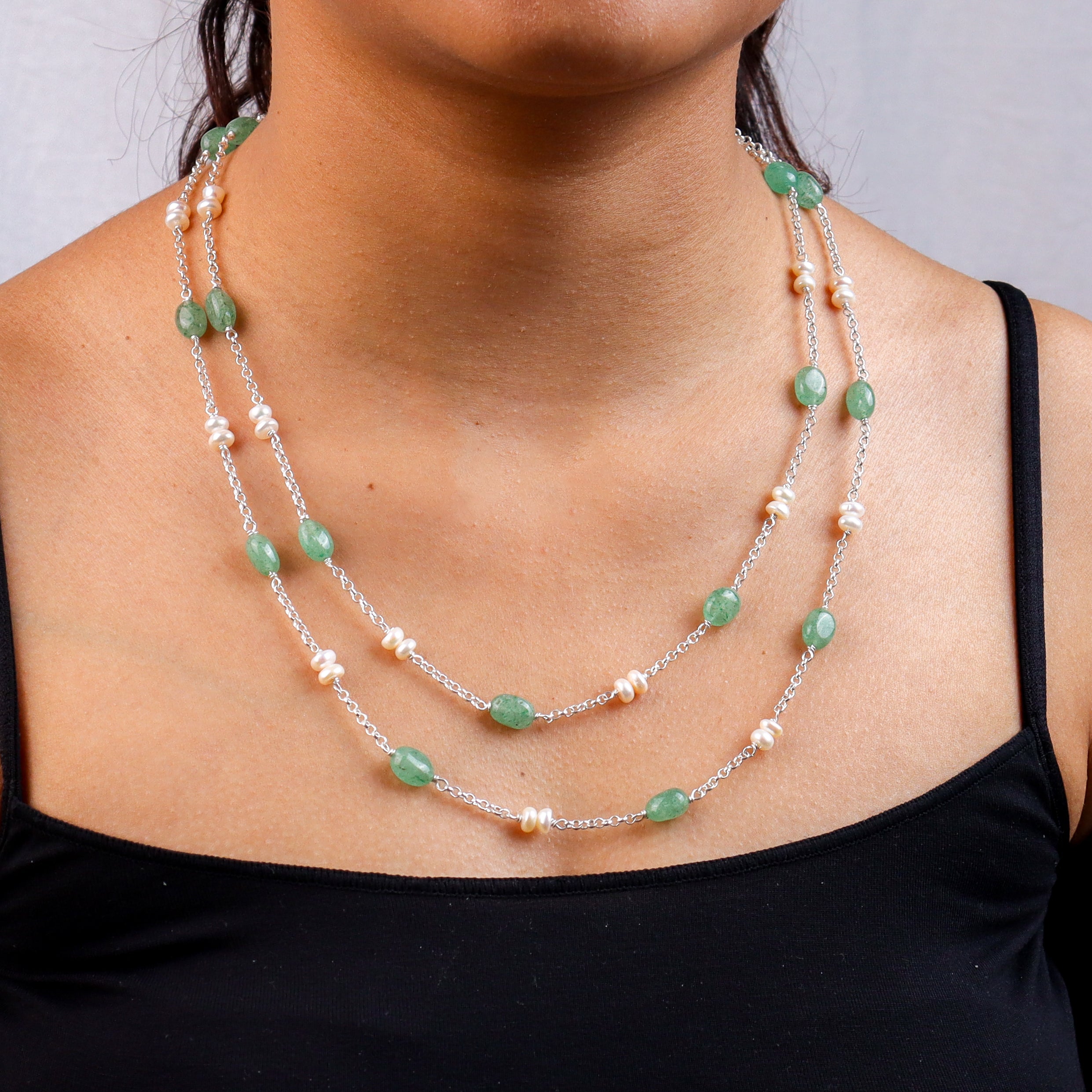 Necklace featuring green Russian Quartz beads and freshwater pearls on silver chain