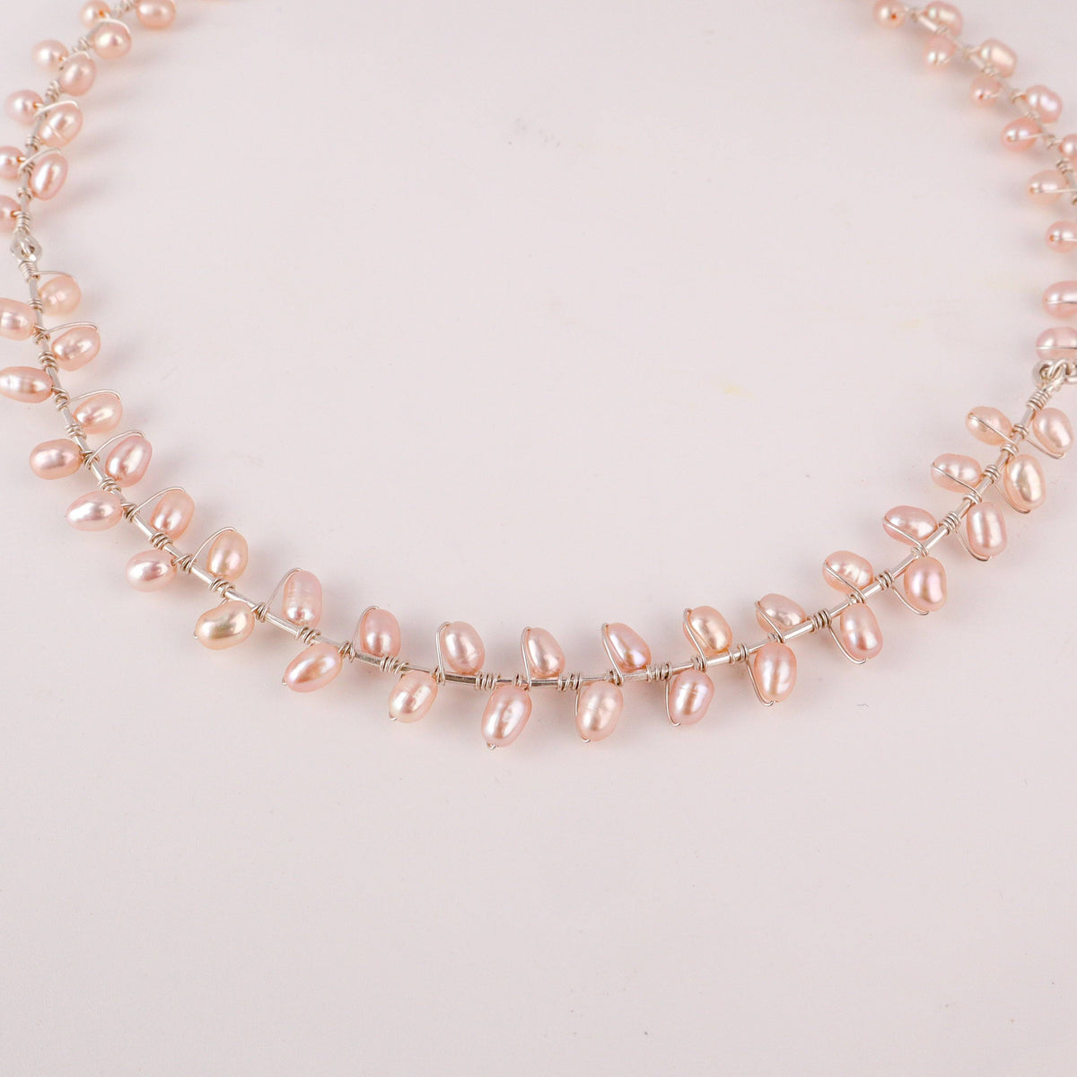 Model wearing fresh water pearl choker for elegant minimalist styling