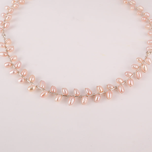 Model wearing fresh water pearl choker for elegant minimalist styling