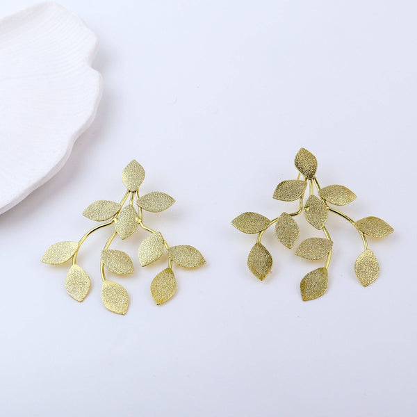 Close-up of Brass Fashion Earrings showcasing intricate detailing, textured elements, and fine craftsmanship