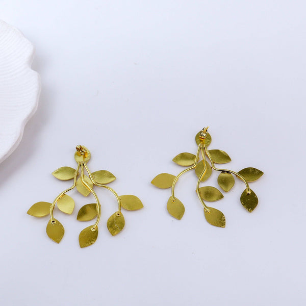 Detailed view of Brass Fashion Earrings highlighting intricate motifs, textured surface, and refined brass finish
