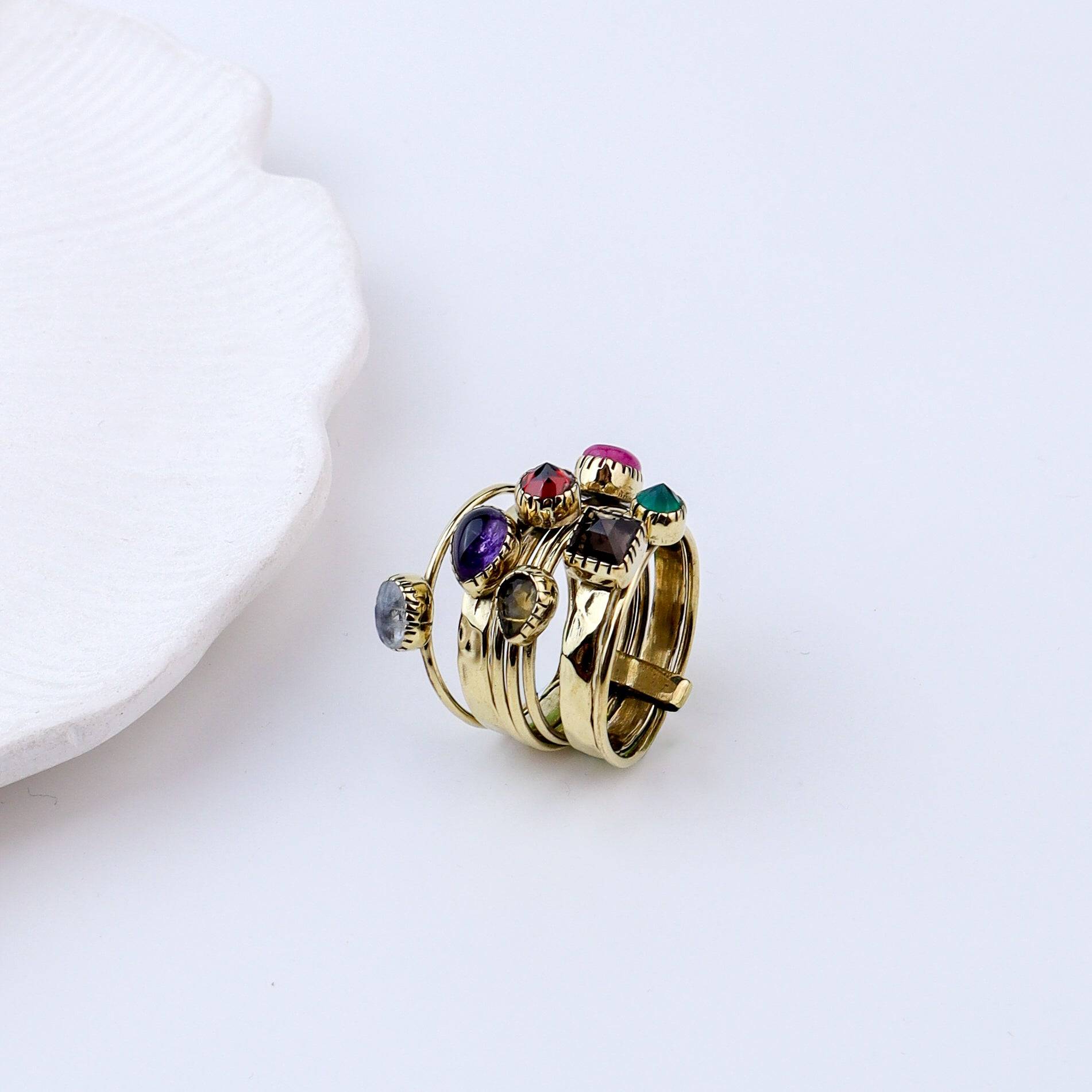 Angled view of Brass Fashion Ring highlighting its distinctive shape and polished brass finish