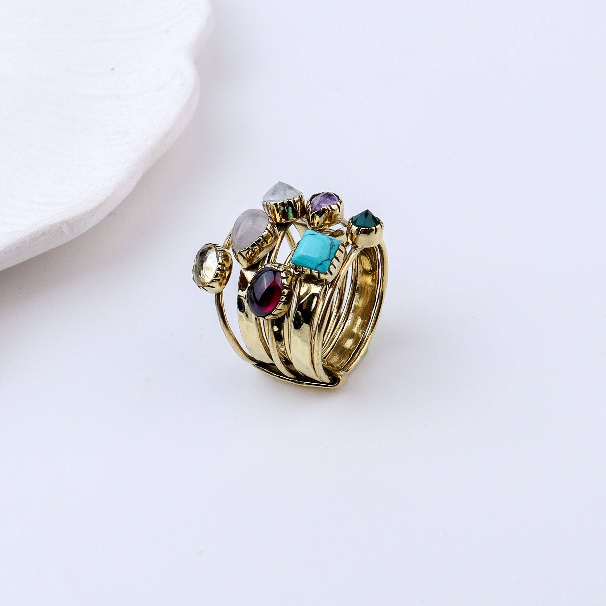 Angled view of Brass Fashion Ring highlighting its distinctive shape and polished brass finish