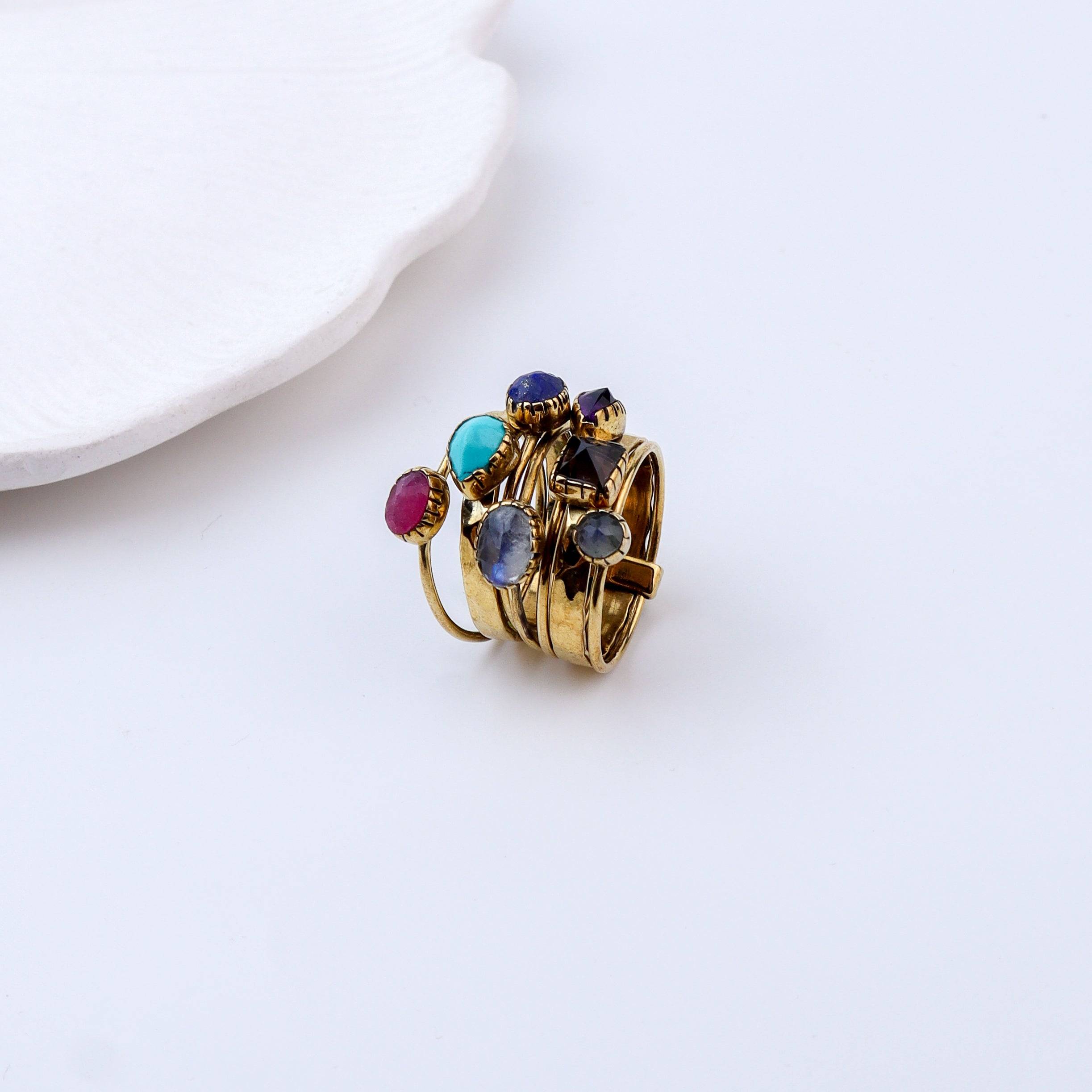 Angled view of Brass Fashion Ring highlighting its distinctive shape and polished brass finish