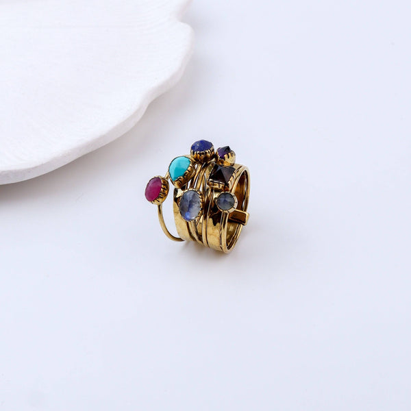 Angled view of Brass Fashion Ring highlighting its distinctive shape and polished brass finish