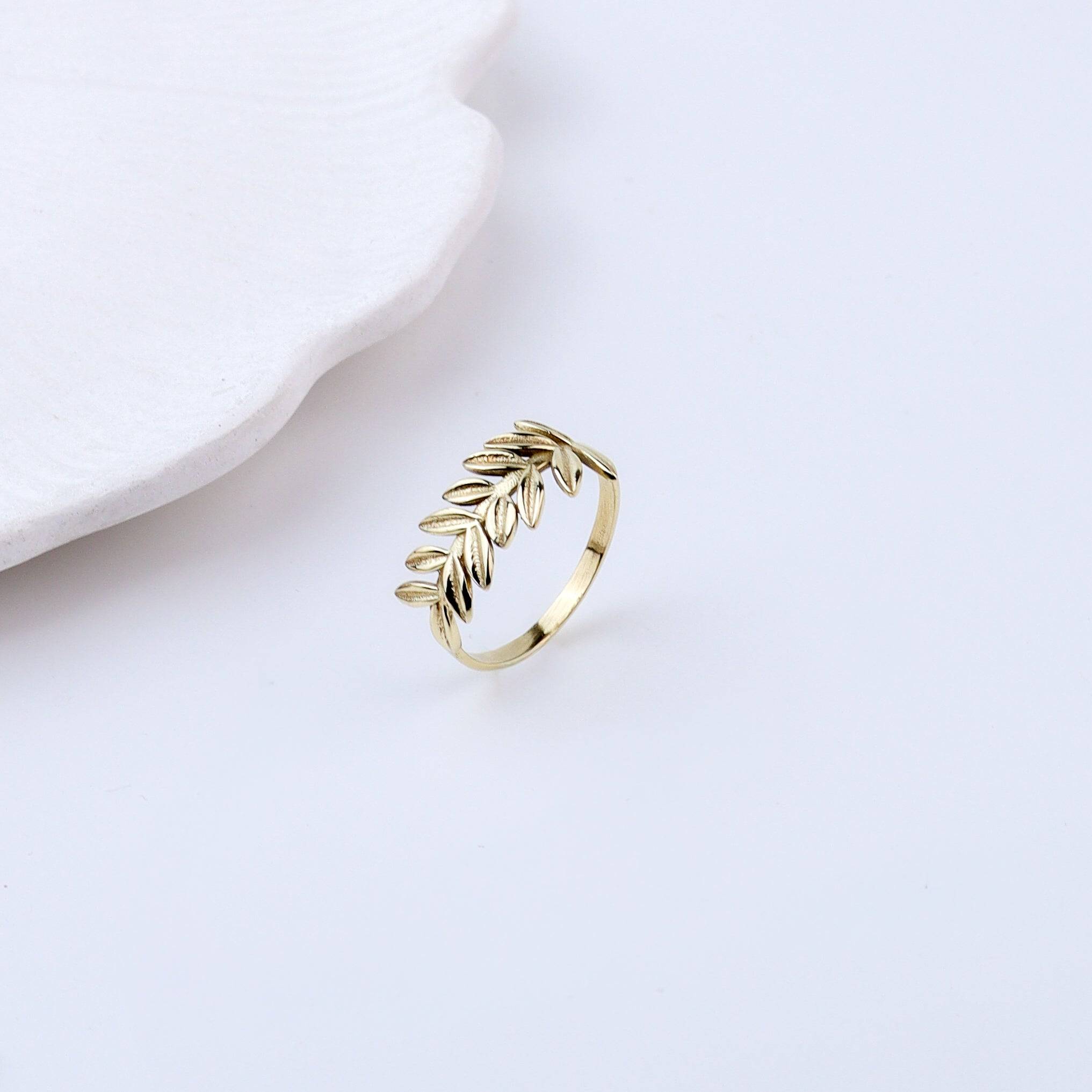 Close-up of a brass fashion ring showcasing intricate detailing, unique design, and fine craftsmanship