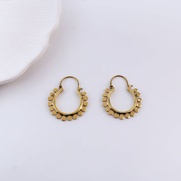 Detailed view of Brass Fashion Earrings highlighting intricate motifs, textured surface, and refined brass finish