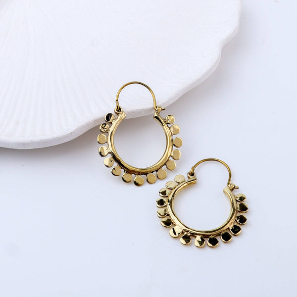 Close-up of Brass Fashion Earrings showcasing intricate detailing, textured elements, and fine craftsmanship
